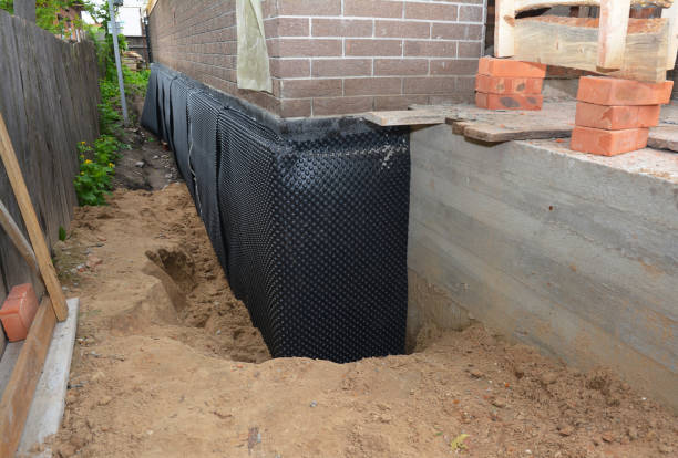 Happy homeowners after waterproofing job in Lakeland